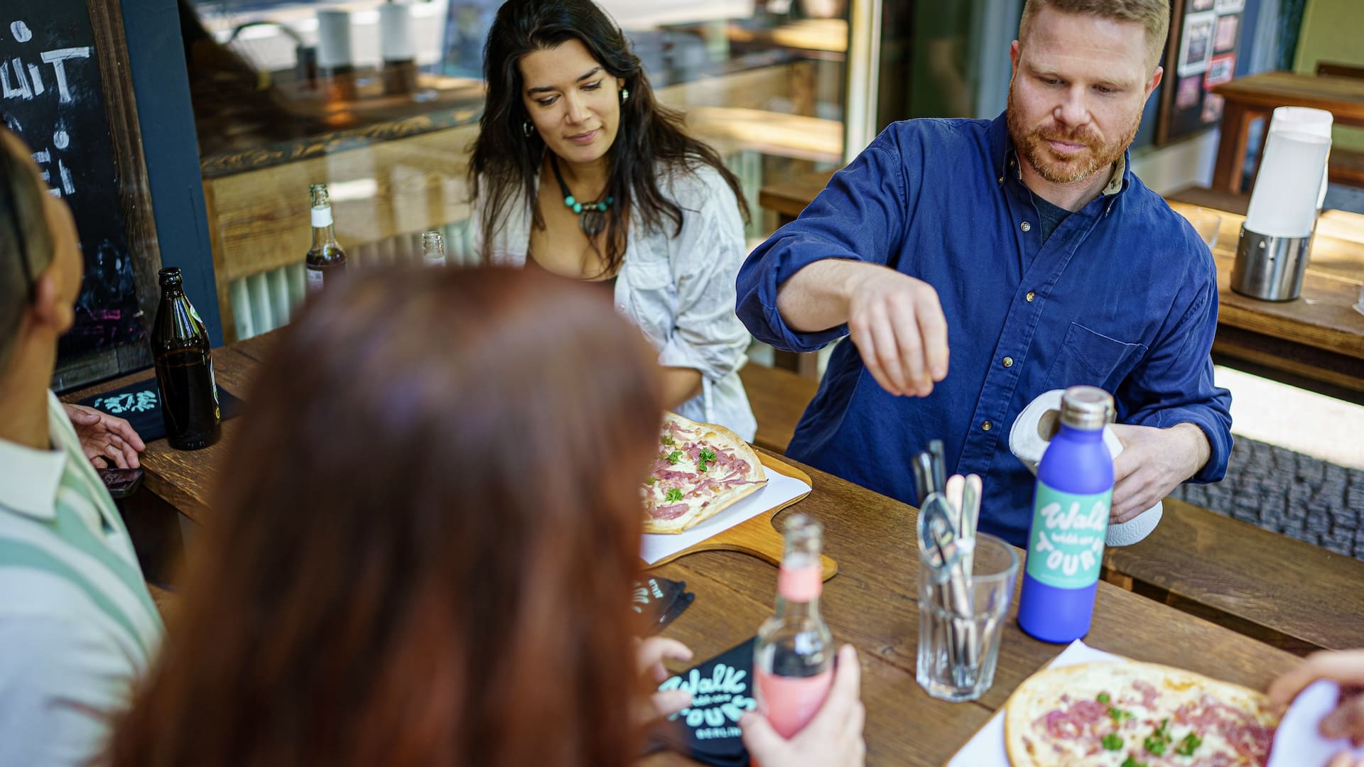Trying traditional delicious German foods on the Berlin street food tour with Walk With Us Tours