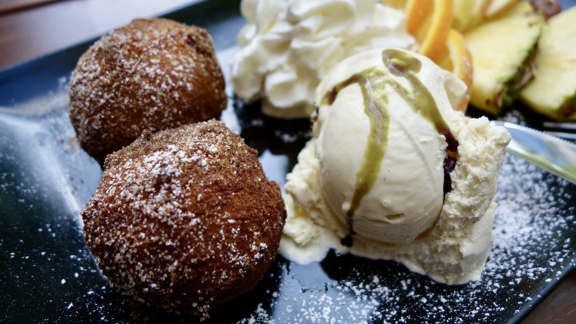 The absolute best dessert in all of Berlin on Walk With Us Tours food tour. Homemade, apple cinnamon dumplings with vanilla ice cream and whip cream.